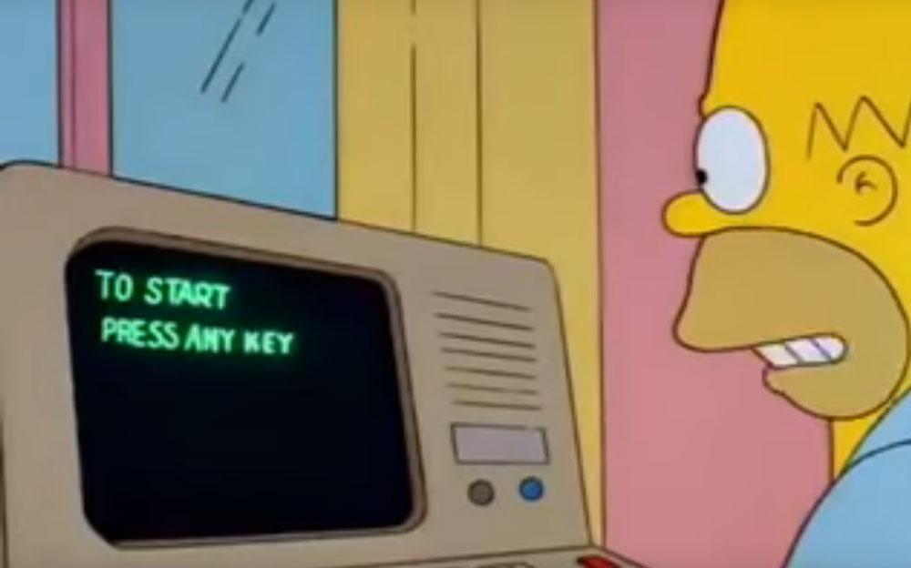 Homer J. Simpson learns how to use a computer, hit any key ...